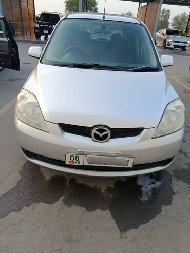 руль для скутера: Mazda Demio: 2006 г., 1.3 л, Автомат, Бензин, Хетчбек