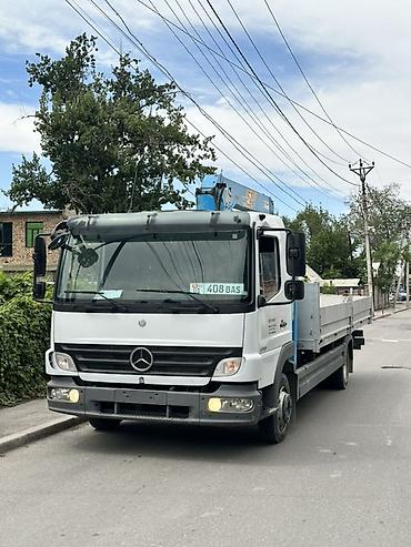 818: Манипулятор, Mercedes-Benz, от 4 т — 2