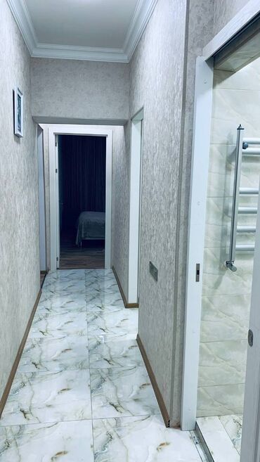 Uzunmüddətli kirayə mənzillər: Bayilda asan xidmətə yaxin 18 mertebeli binanın 5-ci mərtəbəsində — 9