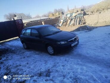 мазда 23: Mazda 323: 2002 г., 1.6 л, Механика, Бензин