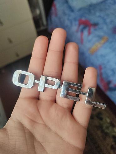 masina opel: Opel arxa yazısı/emblemi – xrom rəng az islənmis təmiz arginal üstən — 1