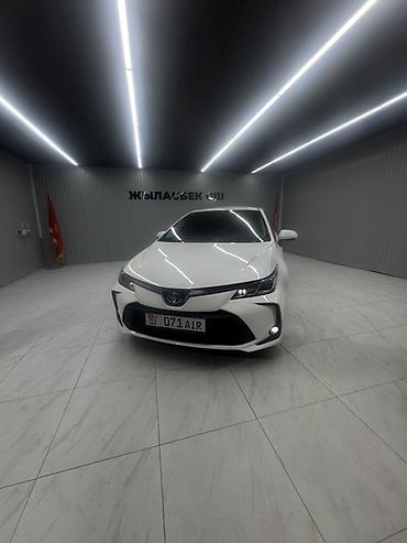 приус 2024: Toyota Corolla: 2022 г., Гибрид, Седан — 2