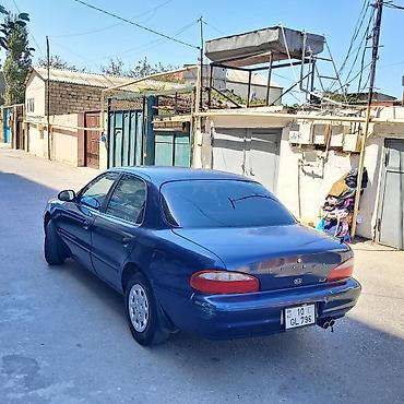 qəzali: Kia Clarus: 2 l | 1997 il Sedan — 7
