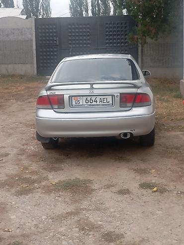Mazda 626: 1995 г., 1.8 л, Механика, Бензин, Седан