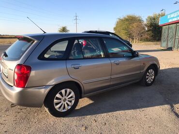 Mazda: Mazda 323: 2002 г., 1.6 л, Механика, Бензин, Хэтчбэк