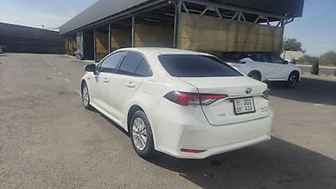 byd e5 2020: Toyota Corolla: 2021 г., 1.8 л, Вариатор, Гибрид, Седан — 3