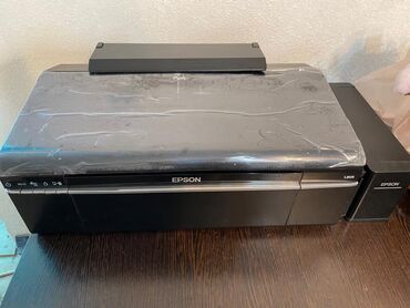 Принтеры: Струйный принтер Epson L805 предназначен для печати фотографий и