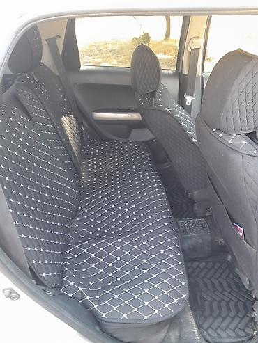 e klass: Toyota Ist: 2003 г., 1.5 л — 6