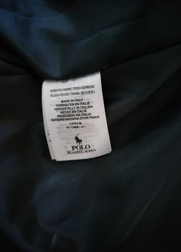 Prsluci: Muški pufnast prsluk bez rukava, crne boje. Detalji: - Visoki kragn i — 9