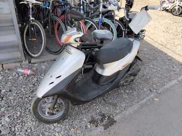 зимние шины на gx: Скутер Honda Dio, отличающийся своим классическим дизайном и