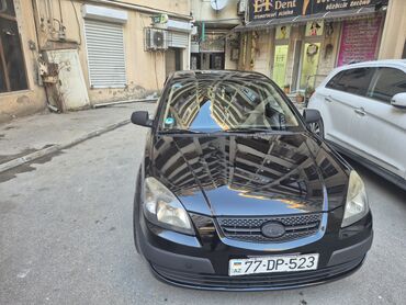 Kia: Kia Rio: 1.4 l | 2009 il Sedan — 13