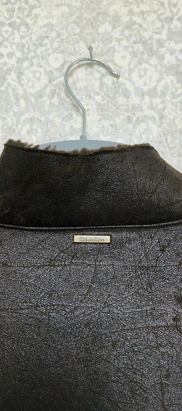 plas kisi: Куртка Американского бренда Calvin Klein 
размер 54 — 4