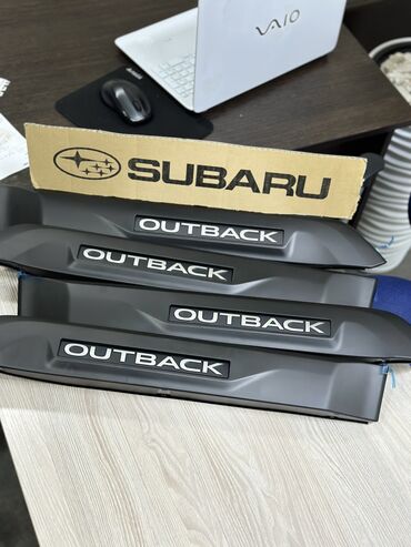 det kostjum: Молдинг на двери Subaru Outback