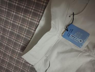 Джинсы: Белые женские джинсы с биркой “Stretch Light Jeans / Cool Jeans”. - — 1