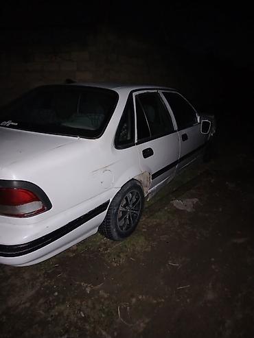 nexia daewoo: Daewoo Nexia, ağ rəng, sedan gövdə. Xüsusiyyətlər: maşın sokulur — 1