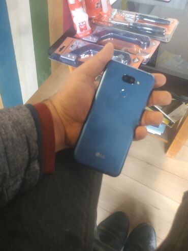 lg g3s: LG K40S, 32 ГБ, цвет - Синий, Сенсорный, Отпечаток пальца, Беспроводная зарядка