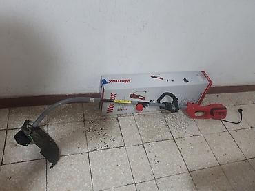 seme jagode: Womax električni trimer za travu W-RT 1200 pod garancijom do 2028 — 1
