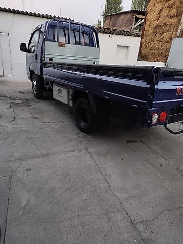 борта: KIA Bongo (K2500/K2700) бортовой малотоннажный грузовик, синий цвет — 7