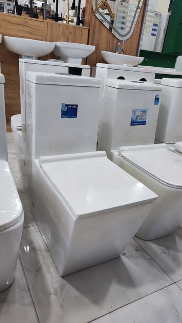 Moydadırlar: Ağ rəngli, keramikadan hazırlanmış "SEVAL" markalı unitaz. Kvadrat