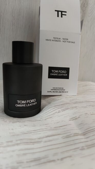 muški prsluci akcija: Ombré Leather (2018) od Tom Ford je kožni miris za žene i muškarce