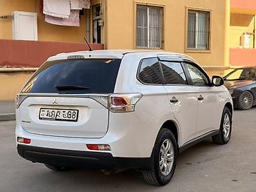 Mitsubishi: Mitsubishi Outlander – ağ rəngli, şəhər və uzun yol üçün rahat və — 12