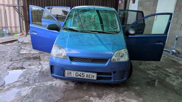 самые дешевые автомобили бу: Daihatsu Cuore: 2004 г., 1.1 л, Автоматтык, Бензин, Универсал