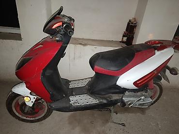 t max: Скутер классический 50–125 см³ (визуально серия Sport/Street) — 2