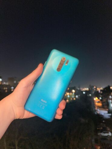 телефон fly fs530 power plus xxl: Xiaomi Redmi 9, цвет - Голубой, 
 Отпечаток пальца, Две SIM карты, Face ID