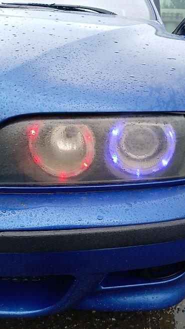 bmw spoler: BMW 5 Seriyası (E39) sedan – mavi rəngdə. Xüsusiyyətlər: - Geniş və — 3