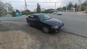 highlander 2: Mazda 626: 2000 г., 1.8 л, Механика, Бензин, Седан — 2