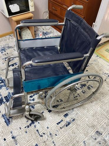 Инвалидные коляски: Инвалидная коляска