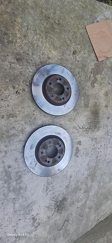 Əyləc diskləri: Ön, Kia 2010, 2010 il, İşlənmiş — 2