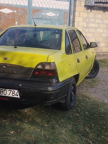 бампер опель вектра б: Daewoo Nexia sedan Xüsusiyyətlər: - Kuzov: 4 qapılı sedan, sarı rəng — 2