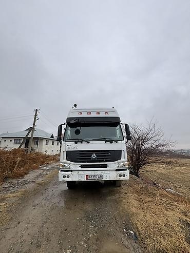 Тягачи: Тягач, Howo, 2012 г., Бортовой — 4