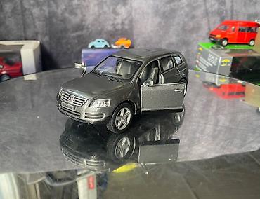 Avtomobil modelləri: Коллекционная модель volkswagen touareg grey metallic 2003 kinsmart — 14