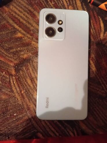 en ucuz soyuducu qiymetleri: Redmi Note 13, 128 ГБ, цвет - Синий, Две SIM карты