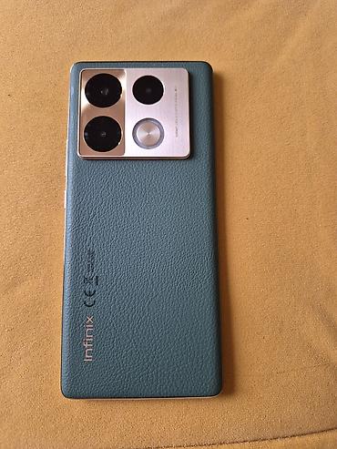 trimer igracka cena: Infinix Note 40 Pro,star manje od dve godine. Zelena pozadina od — 1