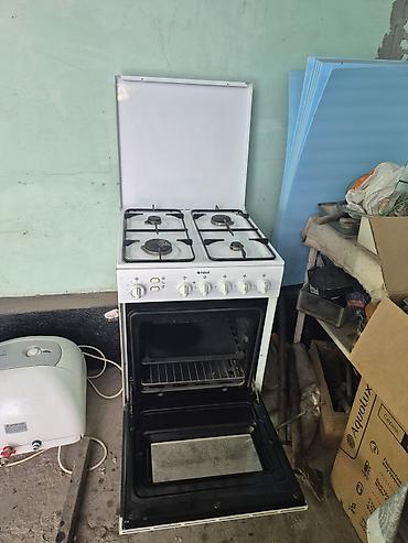 indesit: Газовая плита Indesit с духовкой - 4 газовые конфорки разного — 2