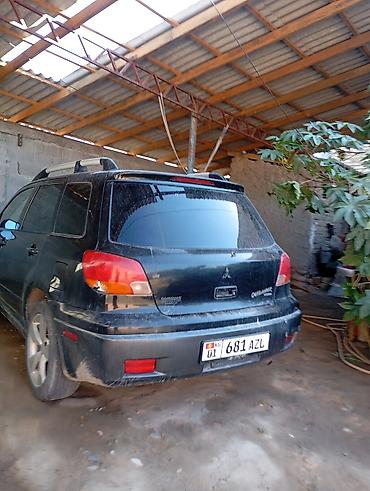 Mitsubishi: Mitsubishi Outlander: 2003 г., 2.4 л, Автомат, Газ, Универсал — 6