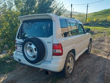 Mitsubishi: Mitsubishi Pajero iO 5 qapı SUV - Kuzov: ağ rəng, 5 qapı, arxa qapıda — 4