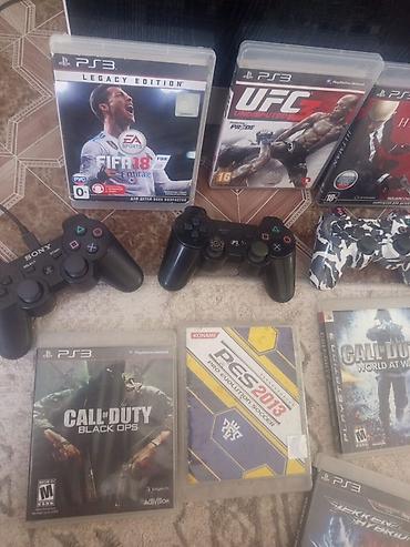 PS3 (Sony PlayStation 3): Игровая консоль Sony PlayStation 3 (модель Slim) с набором дисков — 7