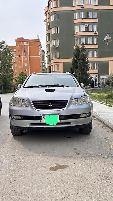 mitsubishi lancer evolution: Mitsubishi airtrek 2003 2 sadə mator ön çəkən Təkərlər təzə di — 3