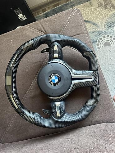 Спортивный руль для BMW с карбоновыми вставками и перфорированной
