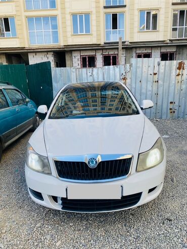 купить машину токмак: Skoda Octavia: 2012 г., 1.6 л, Автомат, Бензин, Седан