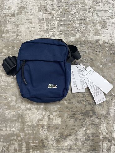 барсетка лакосте: Lacoste Барсетка 
Цена 900сом 
Качество отличное