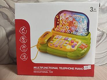 ре: Развивающая игрушка “Multifunctional Telephone Piano” - — 2