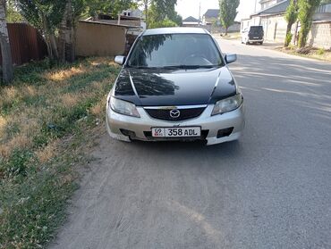 303 эшка: Mazda 323: 2002 г., 1.6 л, Механика, Бензин, Хетчбек