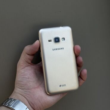 телефоны цена: Samsung Galaxy J1 2016, Б/у, цвет - Золотой, 2 SIM