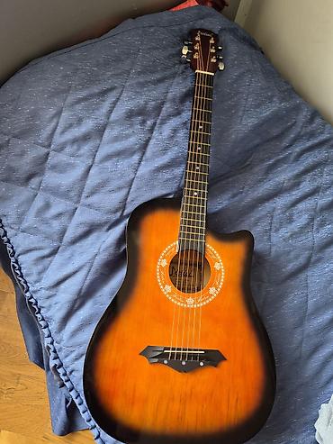 line 6: Akkustik gitara – kəsik korpus (cutaway) dizaynı, 6 simli. Ideal — 1