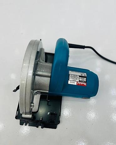 taxta mişarı: Makita 5806 dairəvi mişar - Disk ölçüsü: 185 mm (7") - Güc: 1050 W - — 6